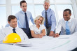 Business people discussing construction plan