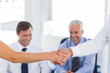 Close up of a handshake