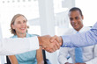 Close up of business people shaking hands
