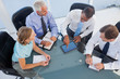 Business people using digital tablet