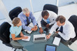 Business people using a laptop