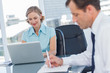 Business woman and business man working