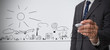 Businessman drawing a town