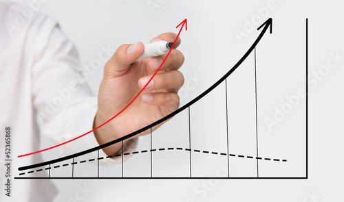 Photo: Businessman drawing graph Businessman drawing graph