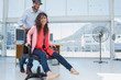 Creative business team having fun on the office chair