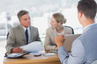 Business people interviewing candidate
