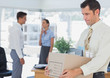 Businessman leaving office after being fired