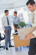 Businessman leaving office after being laid off