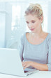 Attractive woman working on her laptop