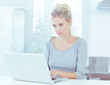 Pretty woman using her laptop