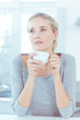 Woman drinking a cup of tea