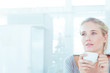 Relaxed attractive woman drinking a cup of tea