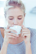 Woman drinking a cup of tea  