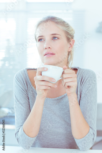 Photo: Woman drinking a cup of tea Woman drinking a cup of tea