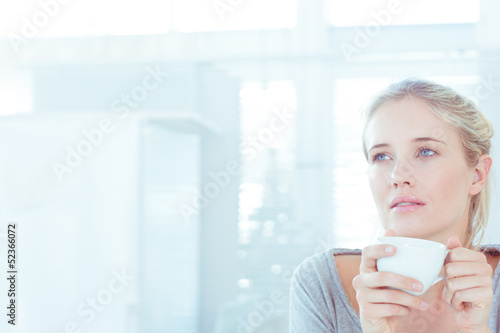 Photo: Relaxed attractive woman drinking a cup of tea Relaxed attractive woman drinking a cup of tea
