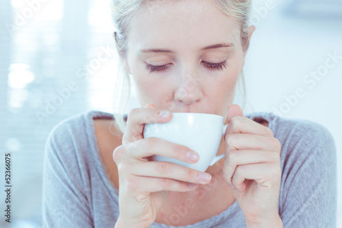 Photo: Woman drinking tea Woman drinking tea