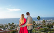 Rear view of a couple on the balcony