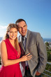 Delighted couple gesturing in front of the camera