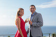 Lovely couple toasting with their flutes of champagne