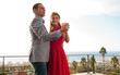 Delighted couple dancing