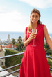 Woman holding glass of champagne