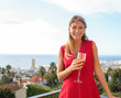 Attractive woman holding flute of champagne