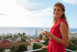 Delighted woman smiling at camera