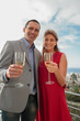 Couple clinking their glass of champagne