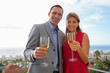 Couple holding glass of champagne