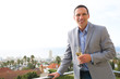 Handsome man holding glass of champagne