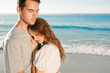 Couple relaxing on the beach