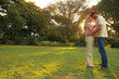 Cute couple relaxing in a park