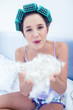 Beautiful woman with hair rollers