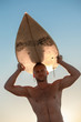 Handsome surfer holding his surfboard