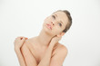 Elegant young woman topless