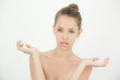 Attractive topless woman gesturing