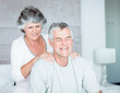 Woman giving a massage to her husband