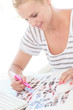 Attractive photo editor working on a contact sheet