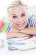 Pretty designer posing on her desk