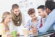 Happy team of creative designers working together