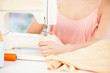Fashion designer using a sewing machine