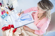 Fashion designer drawing clothes