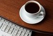 Coffee on computer desk