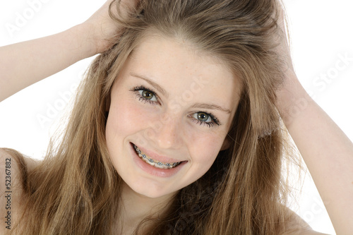 Photo: Freundliche Schülerin rauft sich die Haare Freundliche Schülerin rauft sich die Haare
