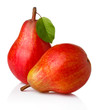Ripe red pear fruits with green leaves isolated
