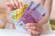 Money in womens hands