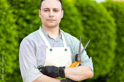 Photo: Handsome young gardener portrait Handsome young gardener portrait