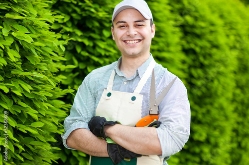 Photo: Handsome young gardener portrait Handsome young gardener portrait