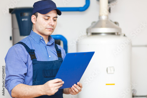 Photo: Portrait of a plumber at work Portrait of a plumber at work