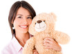 Cute woman with a teddy bear